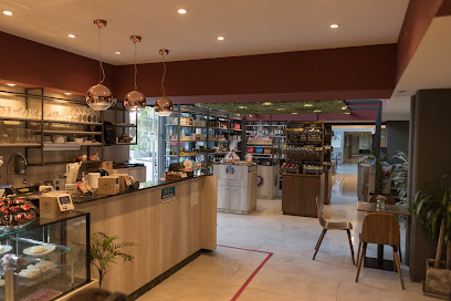 Entre Dos Alfajores Premium Tienda y Cafetería Espacio San Lorenzo