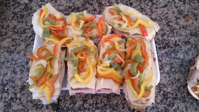 Rotiseria Tutti Quanti - Gastronomía y hostelería