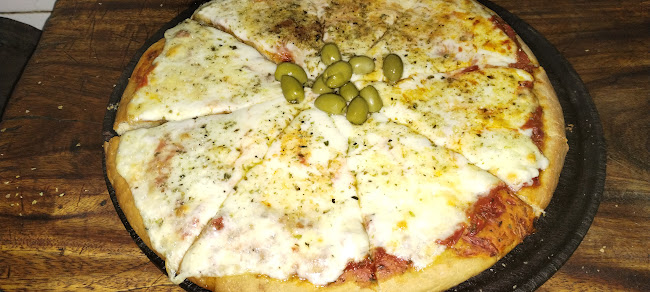 Opinii despre Pizzería El Yaveño. Horno a Leña în La Lonja - Gastronomía y hostelería