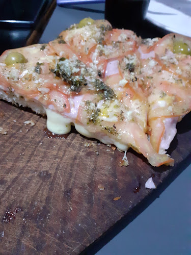 Opinii despre Pizzeria La Amistad în Dock Sud - Gastronomía y hostelería