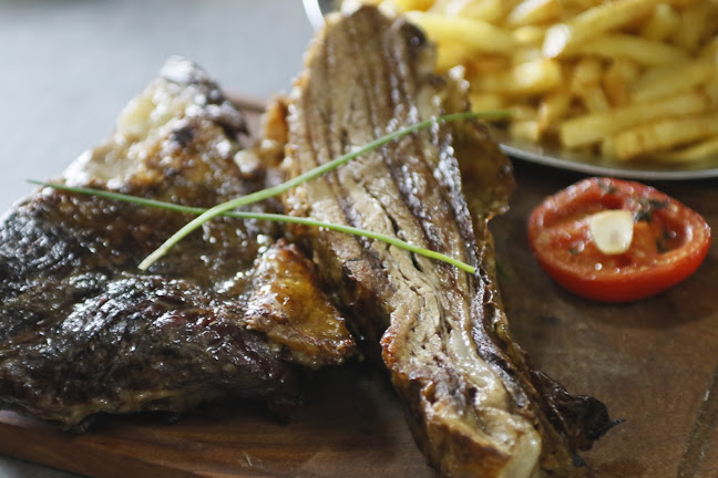 Opinii despre Canta El Gallo - Parrilla (Nordelta) în Tigre - Gastronomía y hostelería