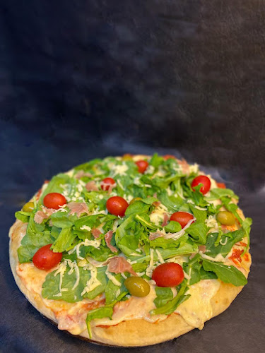 Pizzería Manuelos - Gastronomía y hostelería