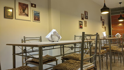 Rueda Vieja La casa Parrillera